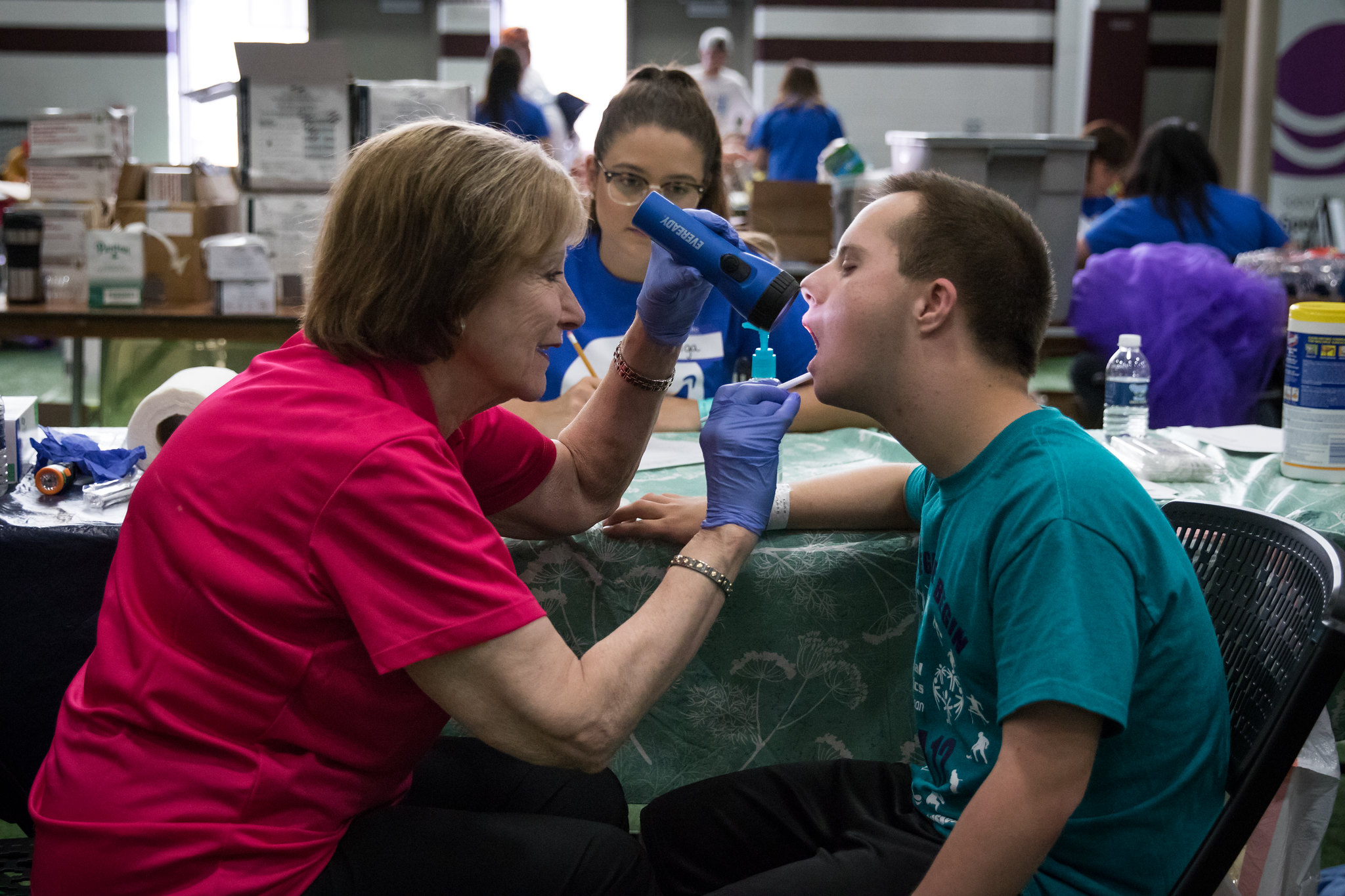 A Special Olympics Michigan athletes receives a dental screening.