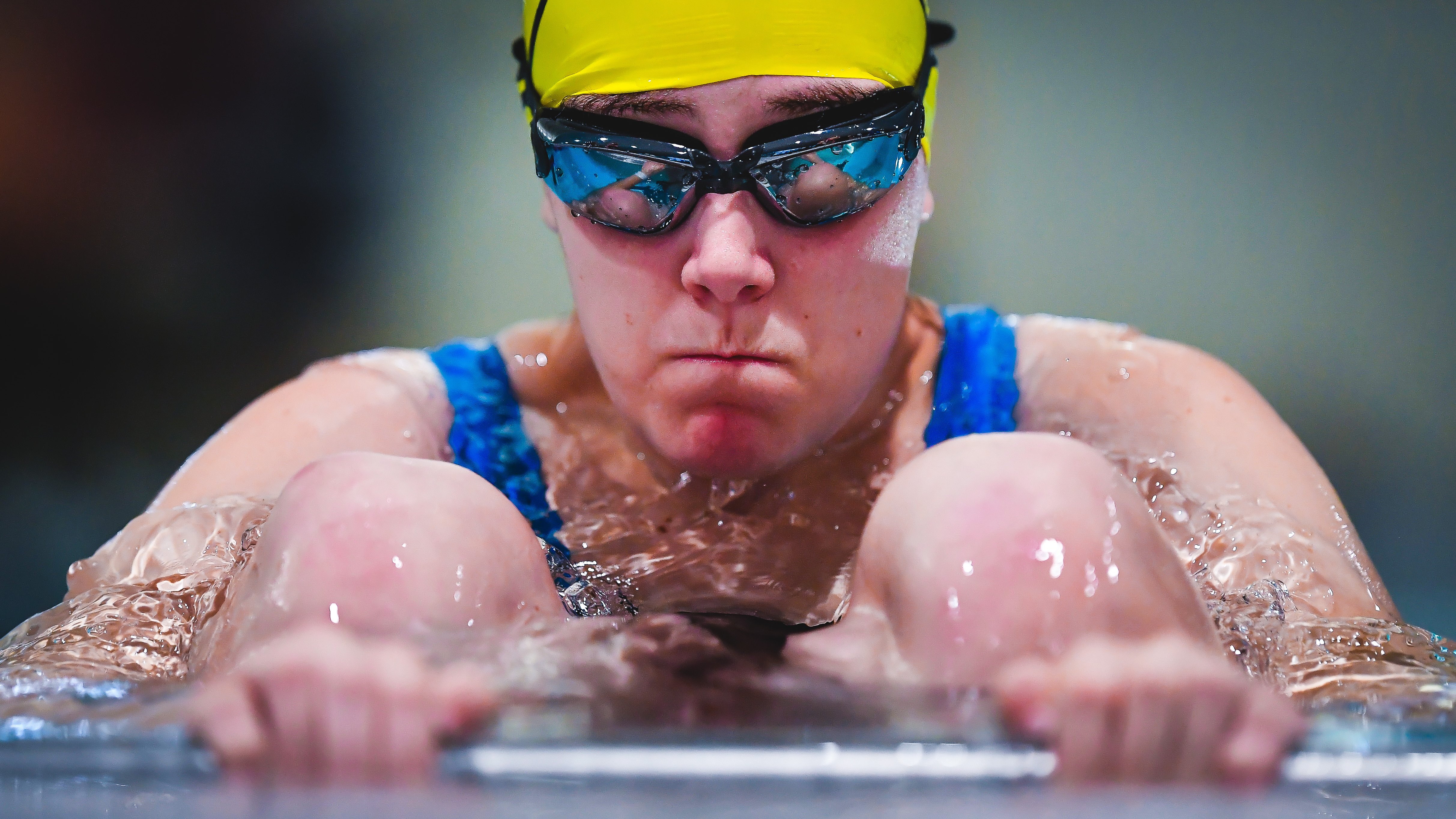 athlete ready to start race in pool