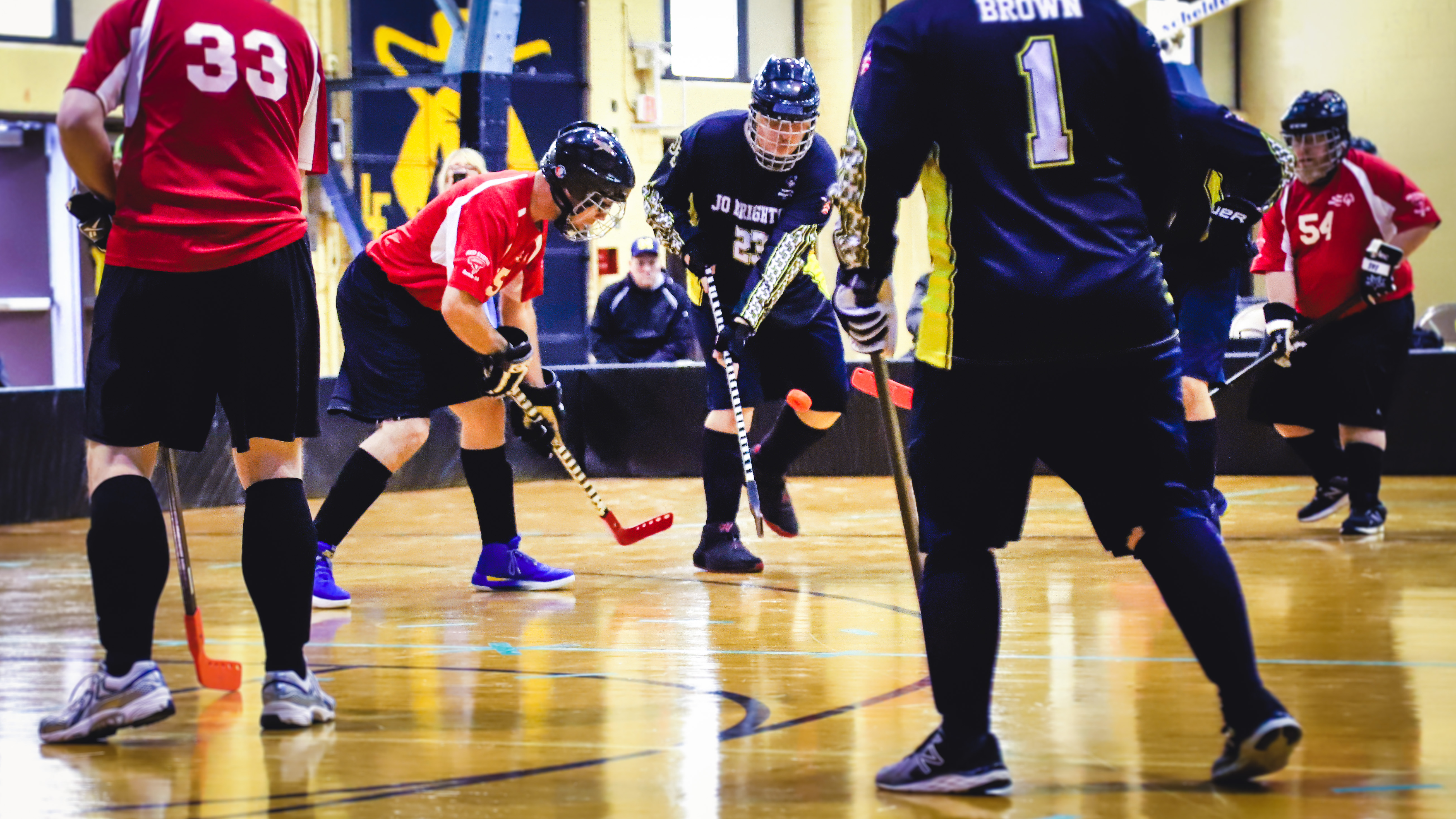 athletes on the court playing poly hockey
