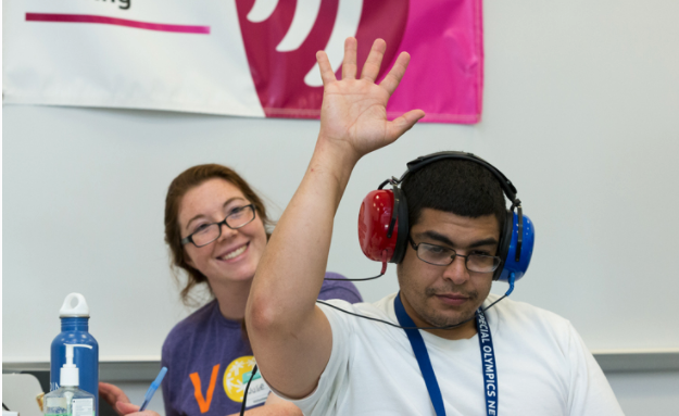 A Special Olympics Michigan athletes receives a hearing screening.