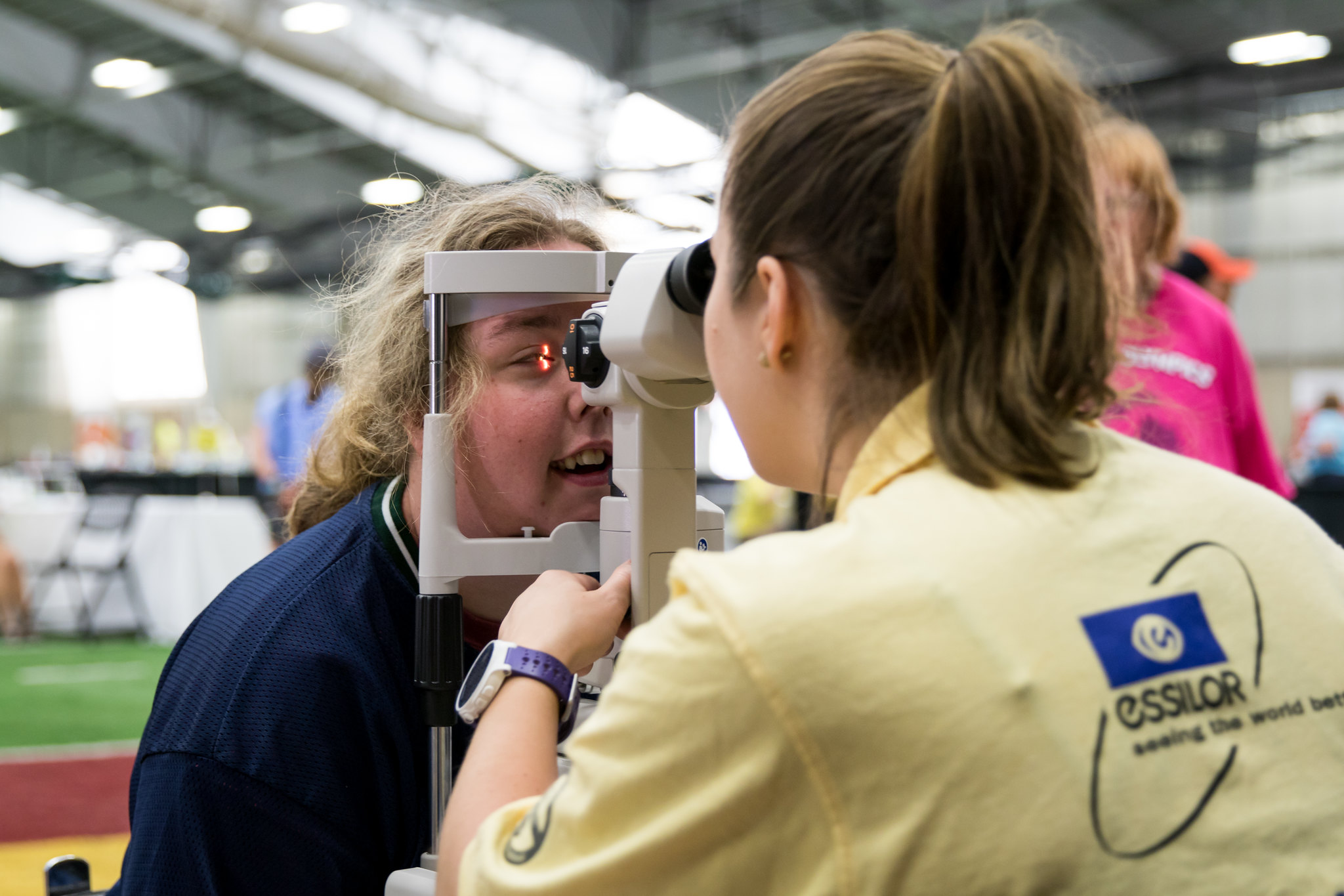 A Special Olympics Michigan athletes receives an eye screening.