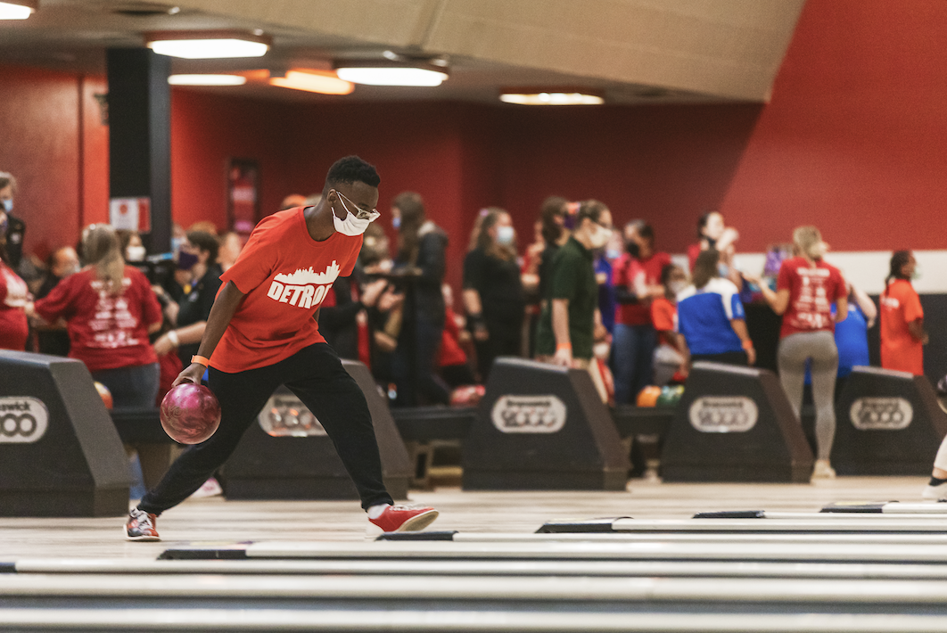 athlete bowling at lanes