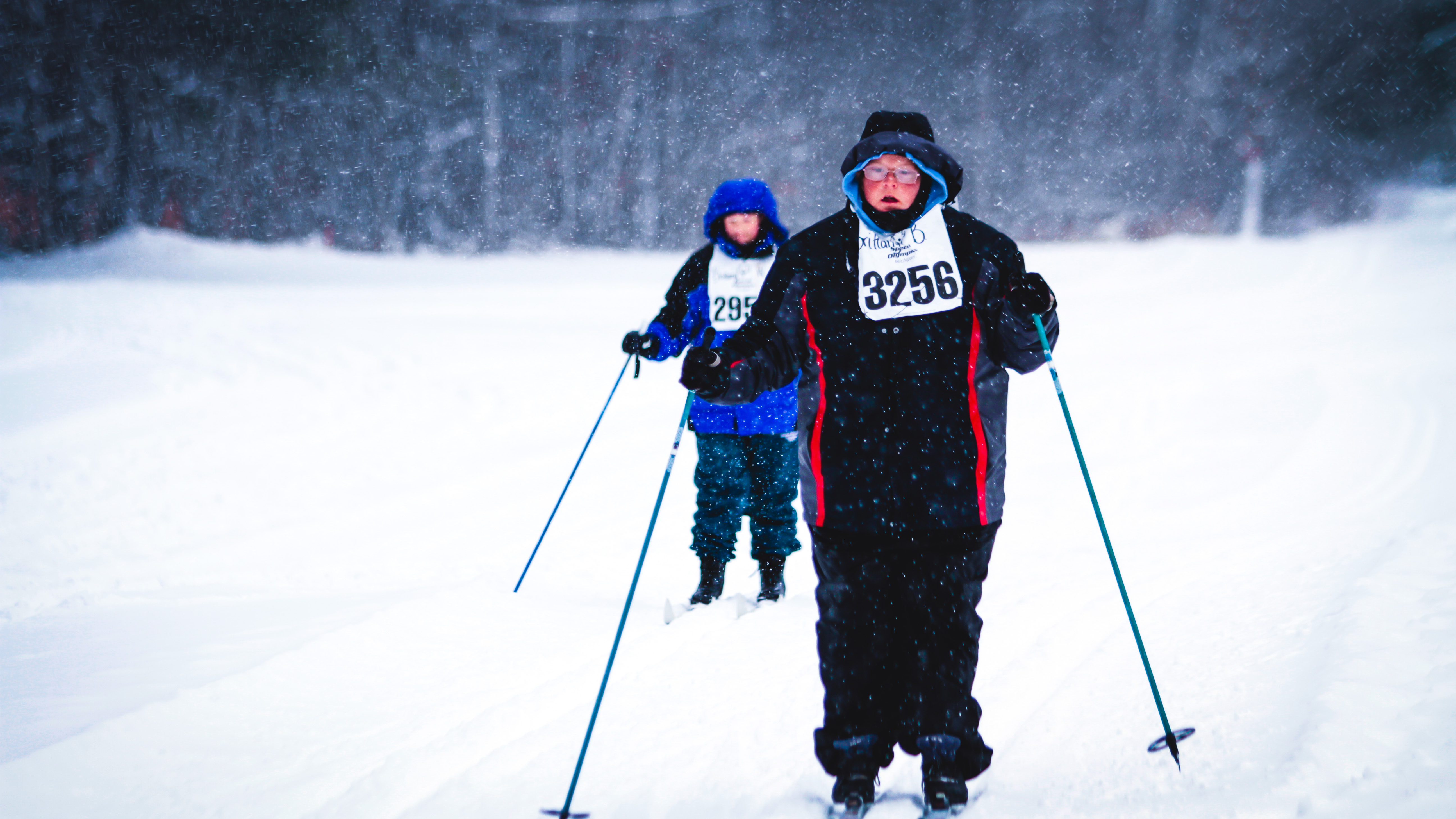 athletes skiing cross country