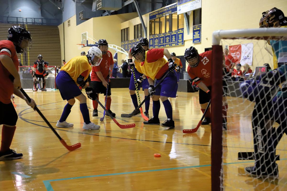 Athletes compete in Poly Hockey at the State Finals.