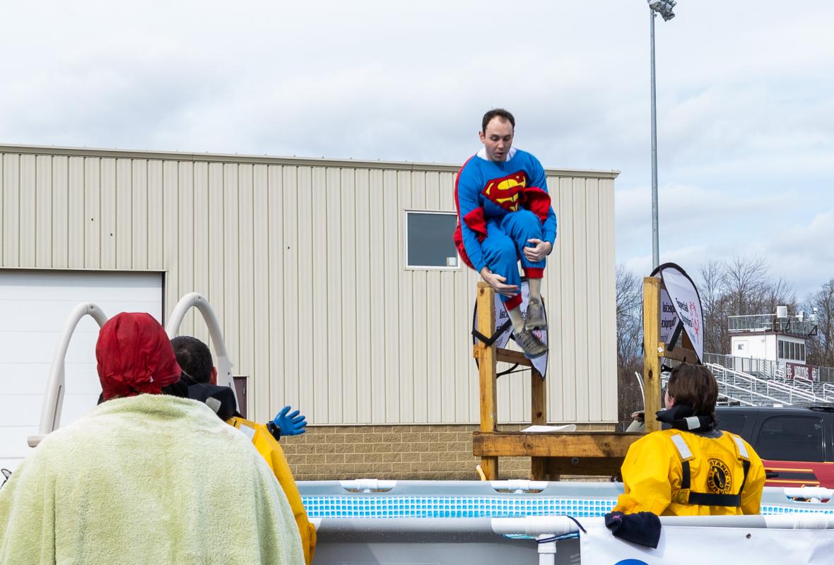 Educator plunges five times for students unable to.