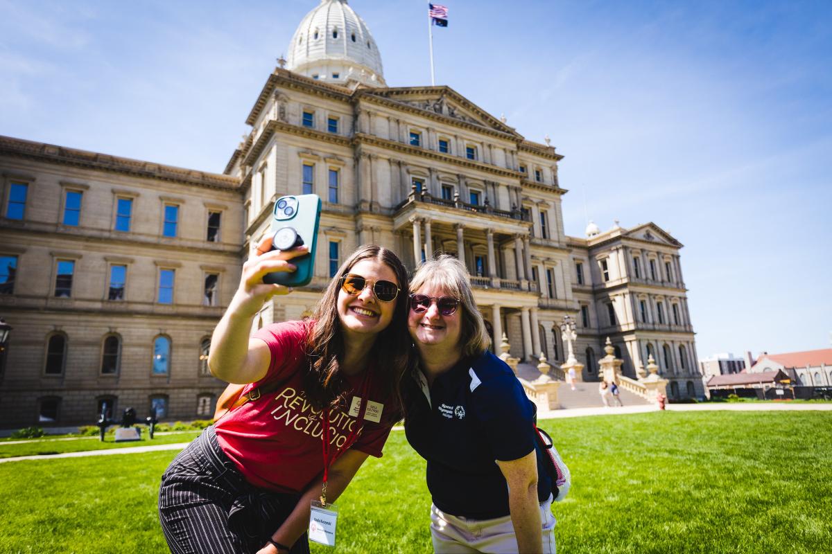 Posing for a picture outside the state Capitol