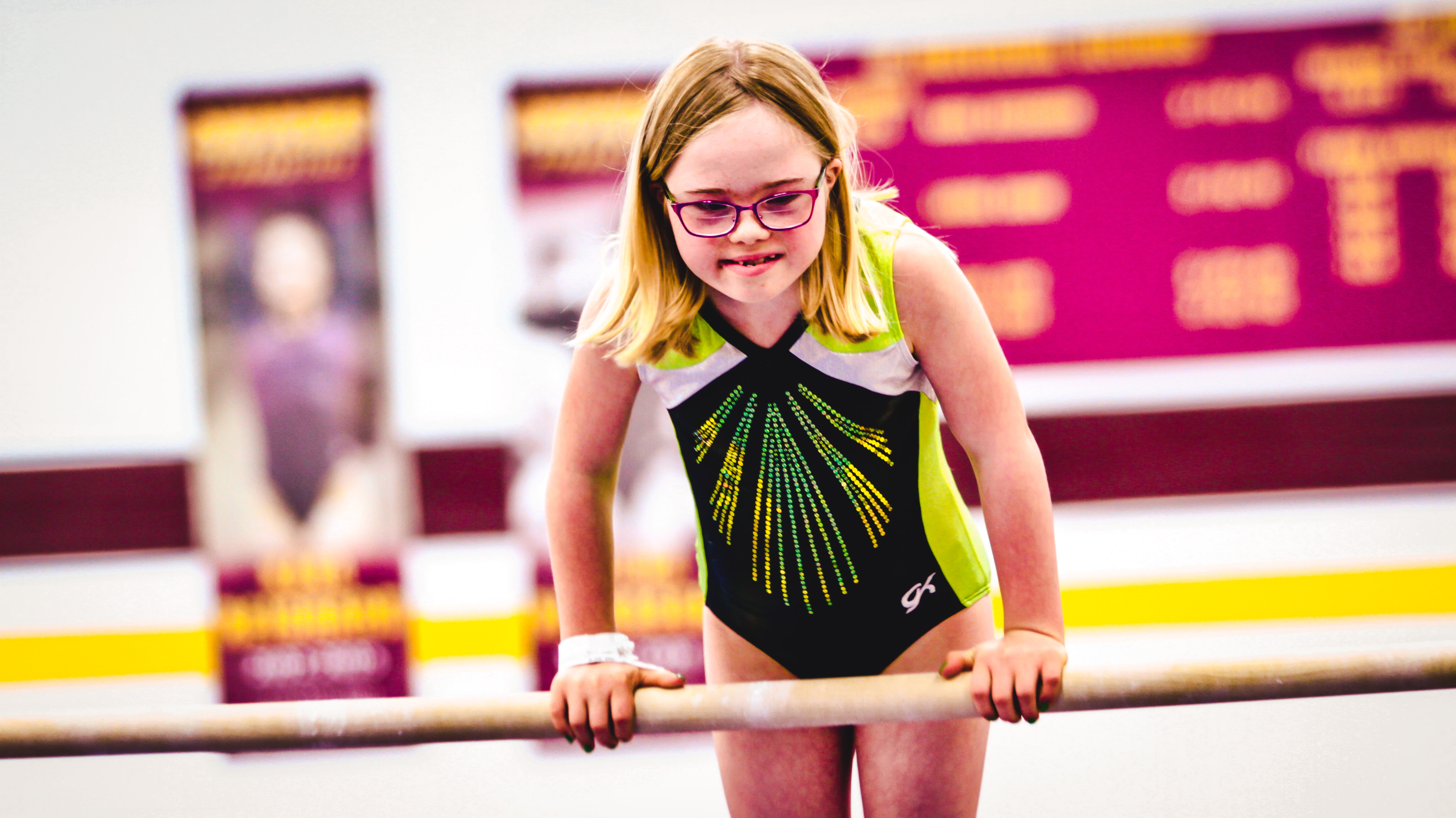 athlete on balance bars