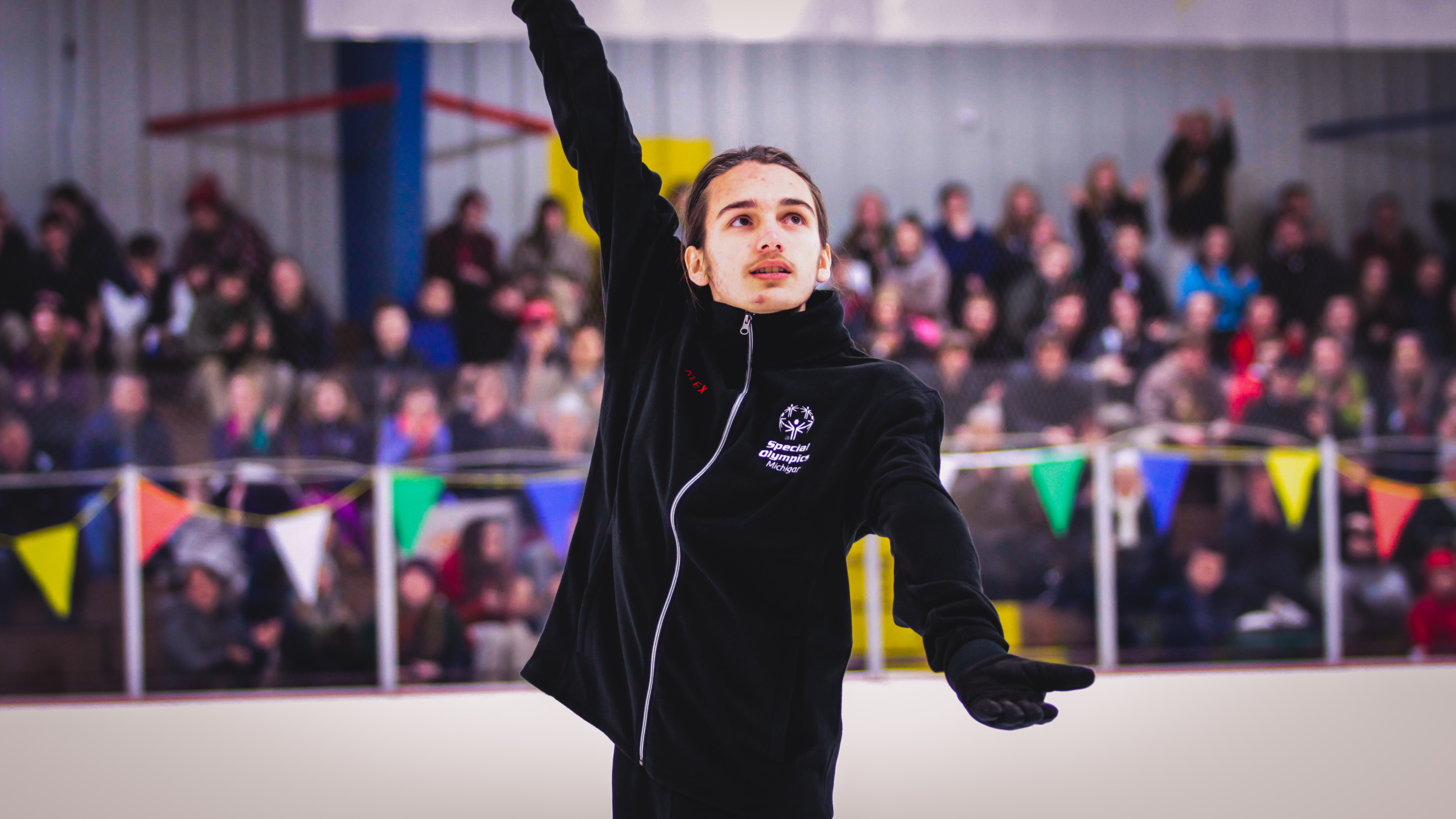 athlete finishing their routine on the ice