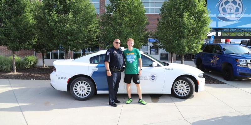 Detroit Police Chief lights cauldron during Special Olympics Opening Ceremony.