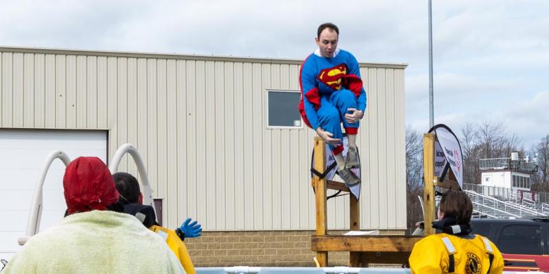 Educator plunges five times for students unable to. 