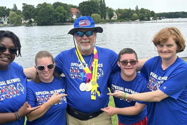 Coleman and team showcasing their World Games medals