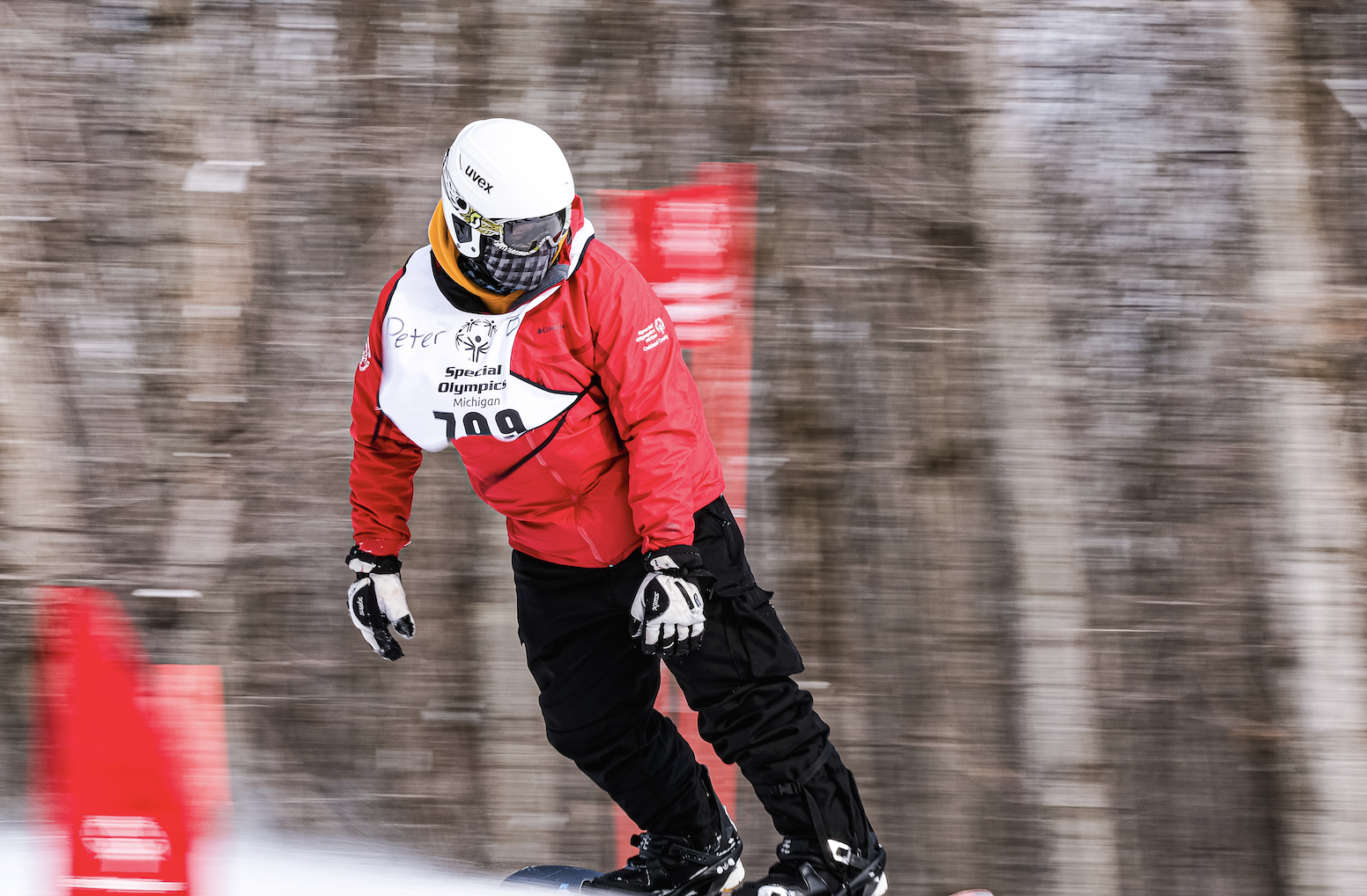 Snowboarder down mountain